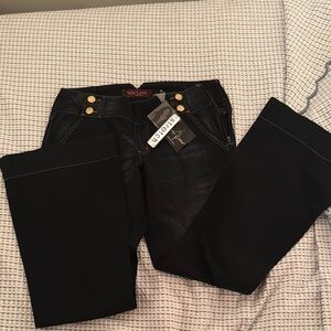 Vintage Dark blue baby phat jeans with gold accents brand new